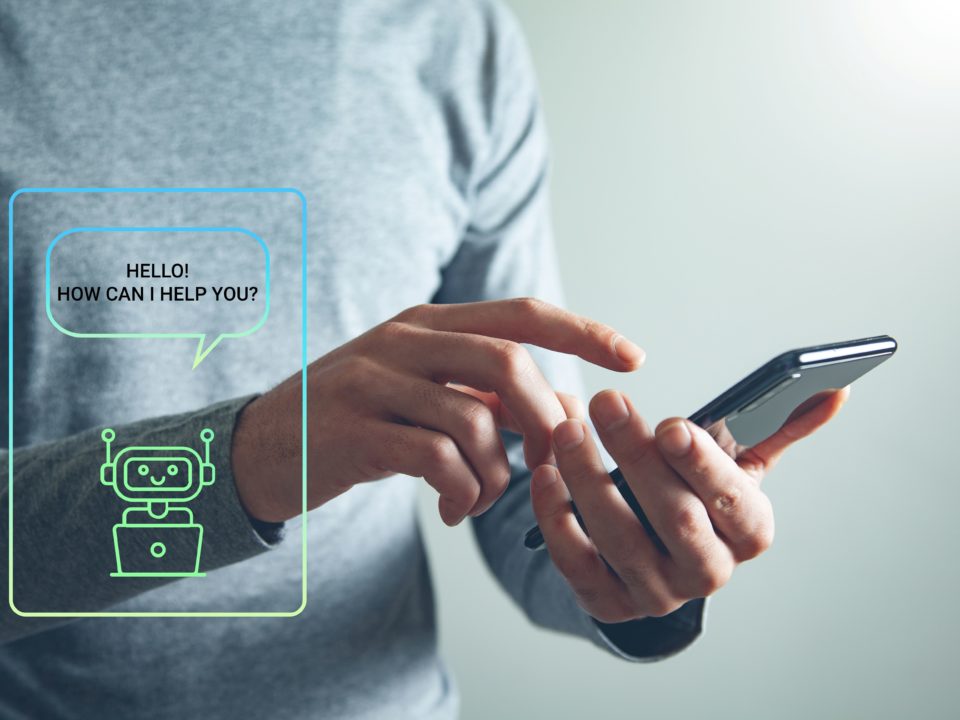 Person using a smartphone to talk to a chatbot.