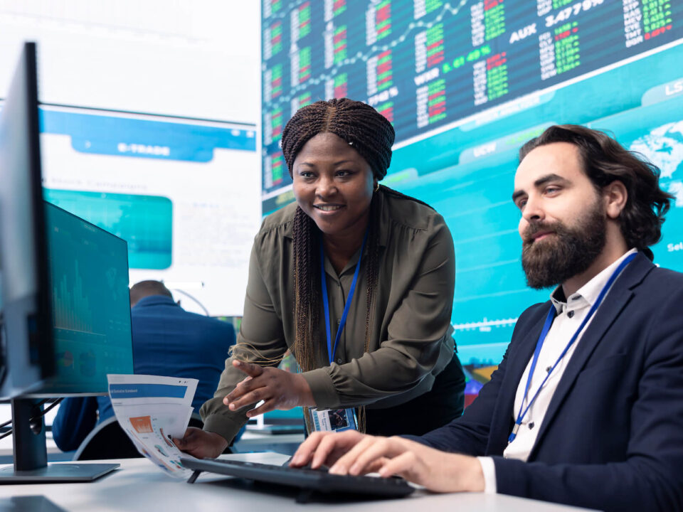 Hedge fund team collaborating in the office