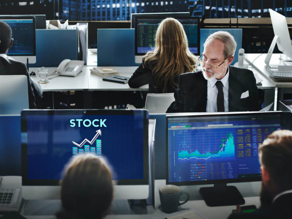 Are Investors and Traders Missing Out on Crucial Market Sentiment Data? - Stockgeist Traders analyzing stock market sentiment data